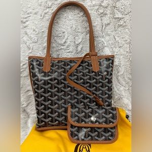 Authentic Goyard mini reversible Anjou in black and tan combination.